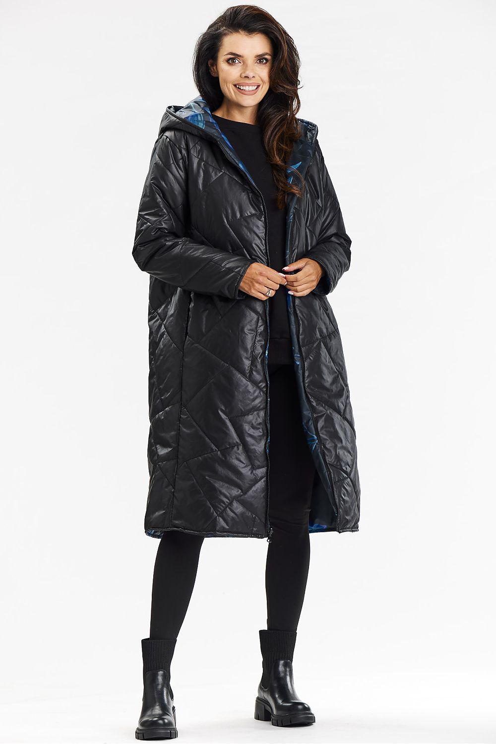 Black double-stitched jacket with a hood and leaf pattern