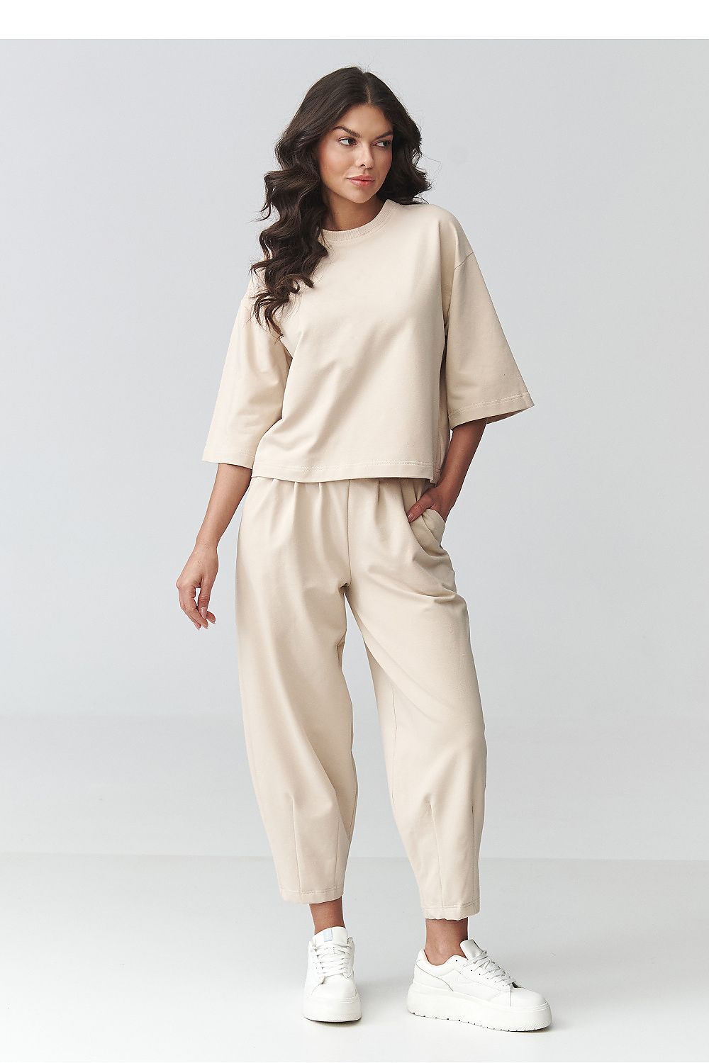 Women's beige trousers and blouse set