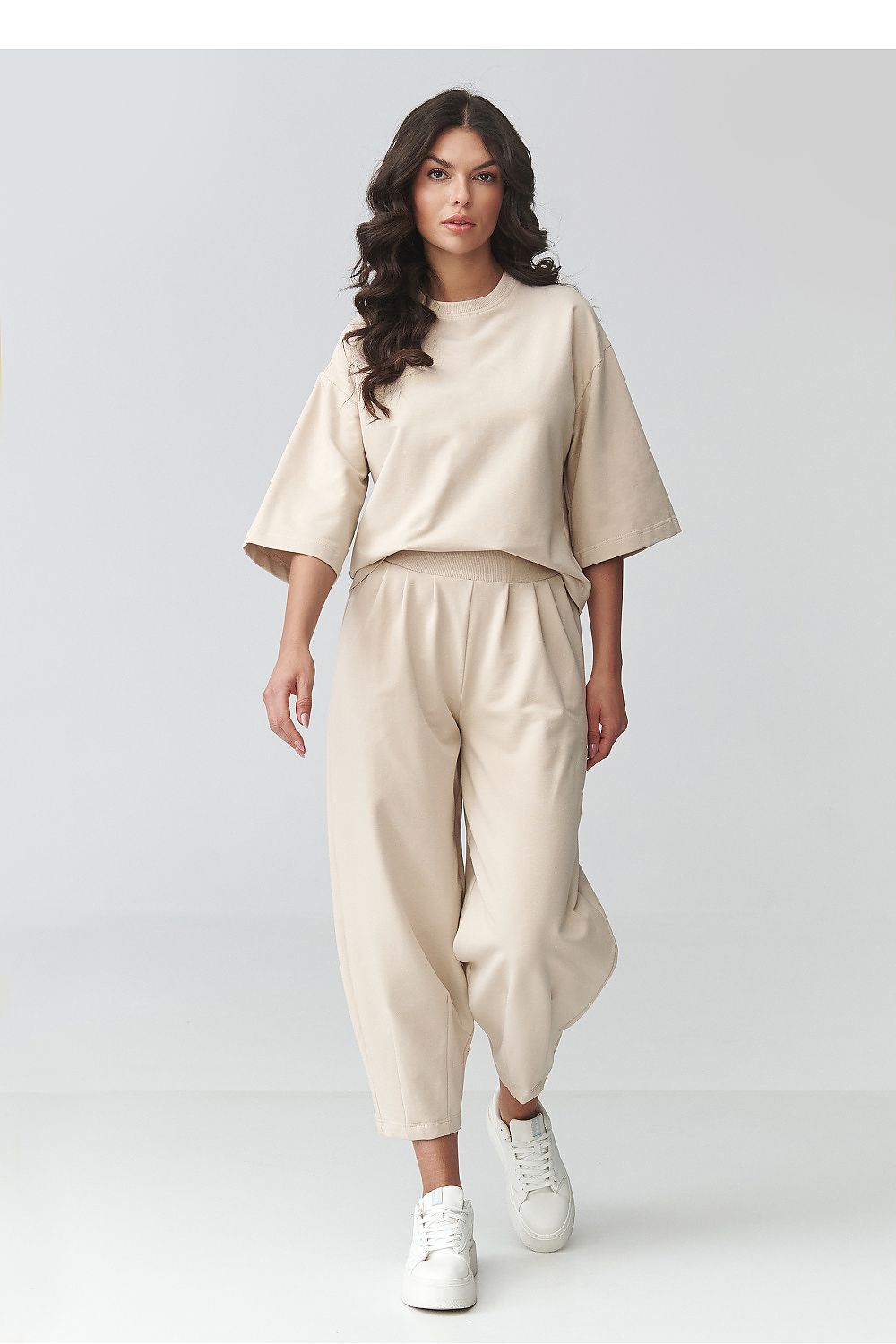 Women's beige trousers and blouse set