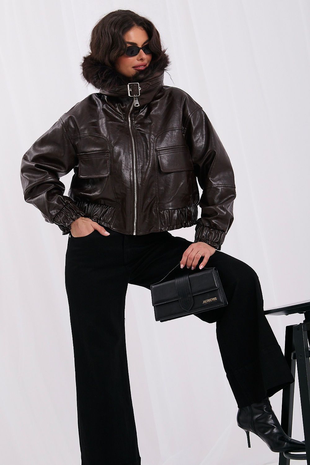 Short brown faux leather jacket with fur collar and pockets