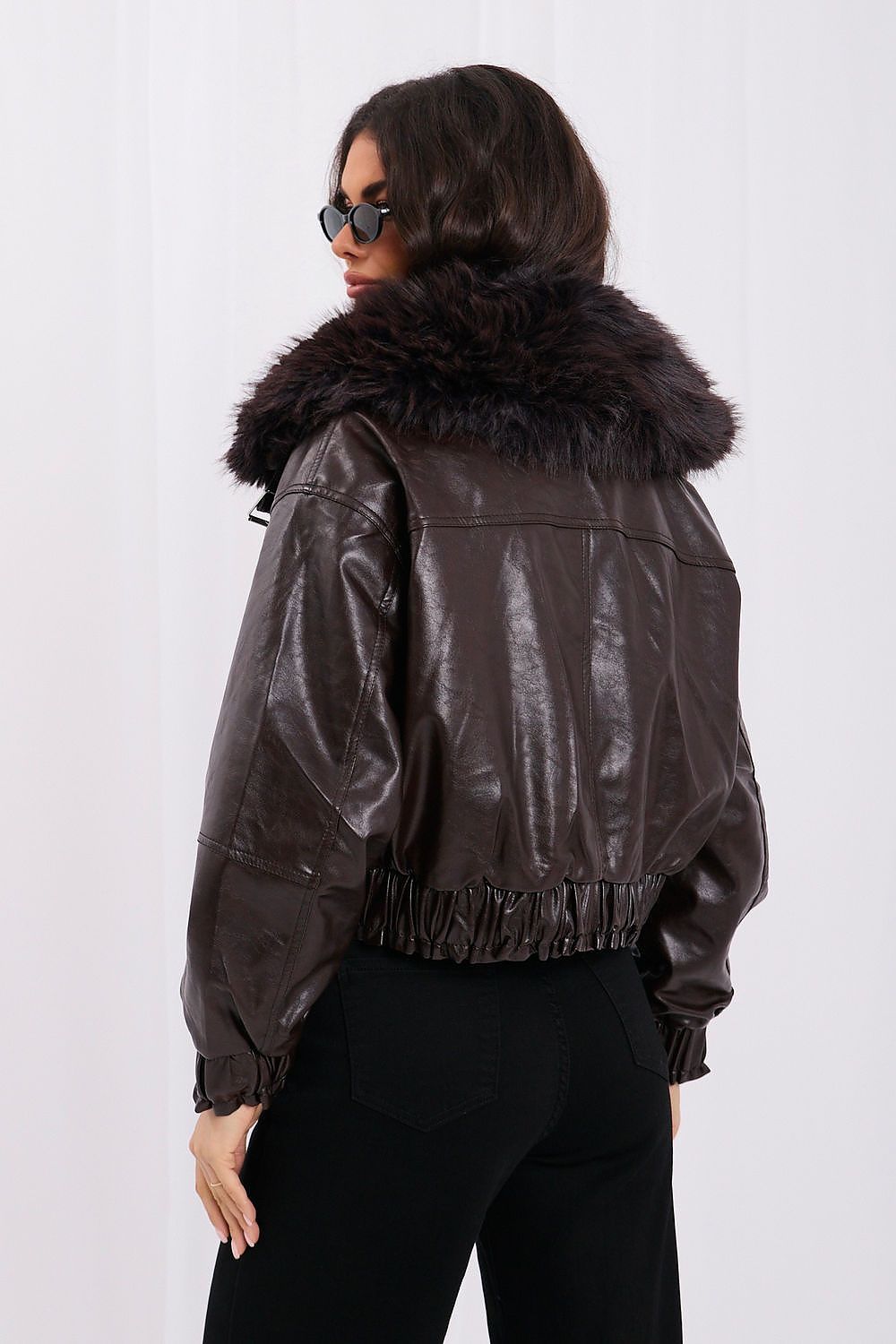 Short brown faux leather jacket with fur collar and pockets