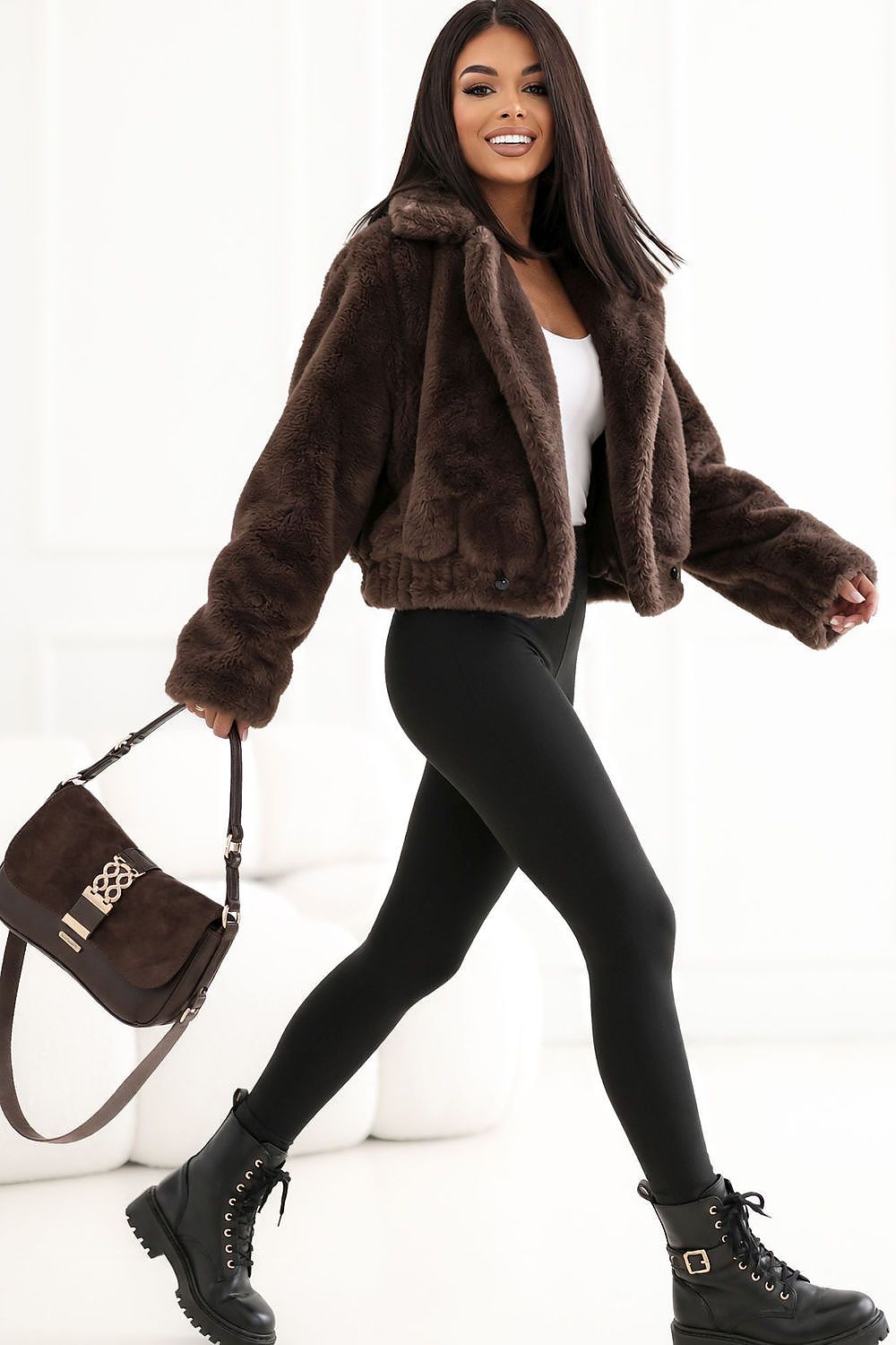 Short women's fur jacket with wide lapels