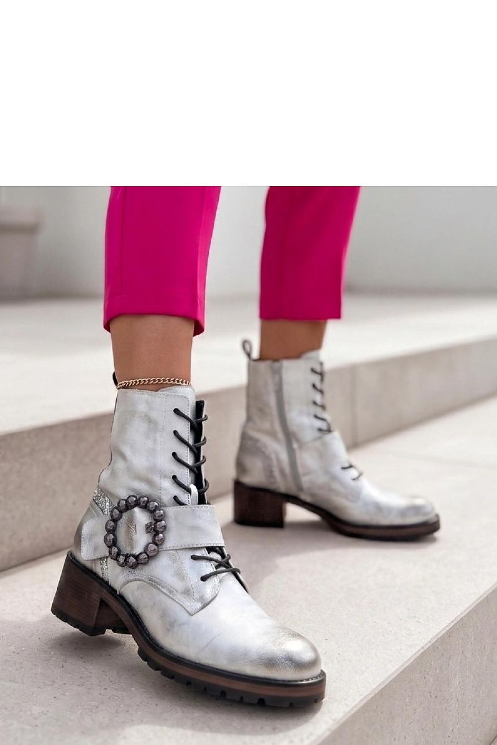 Grey lined ankle boots with padding and buckle