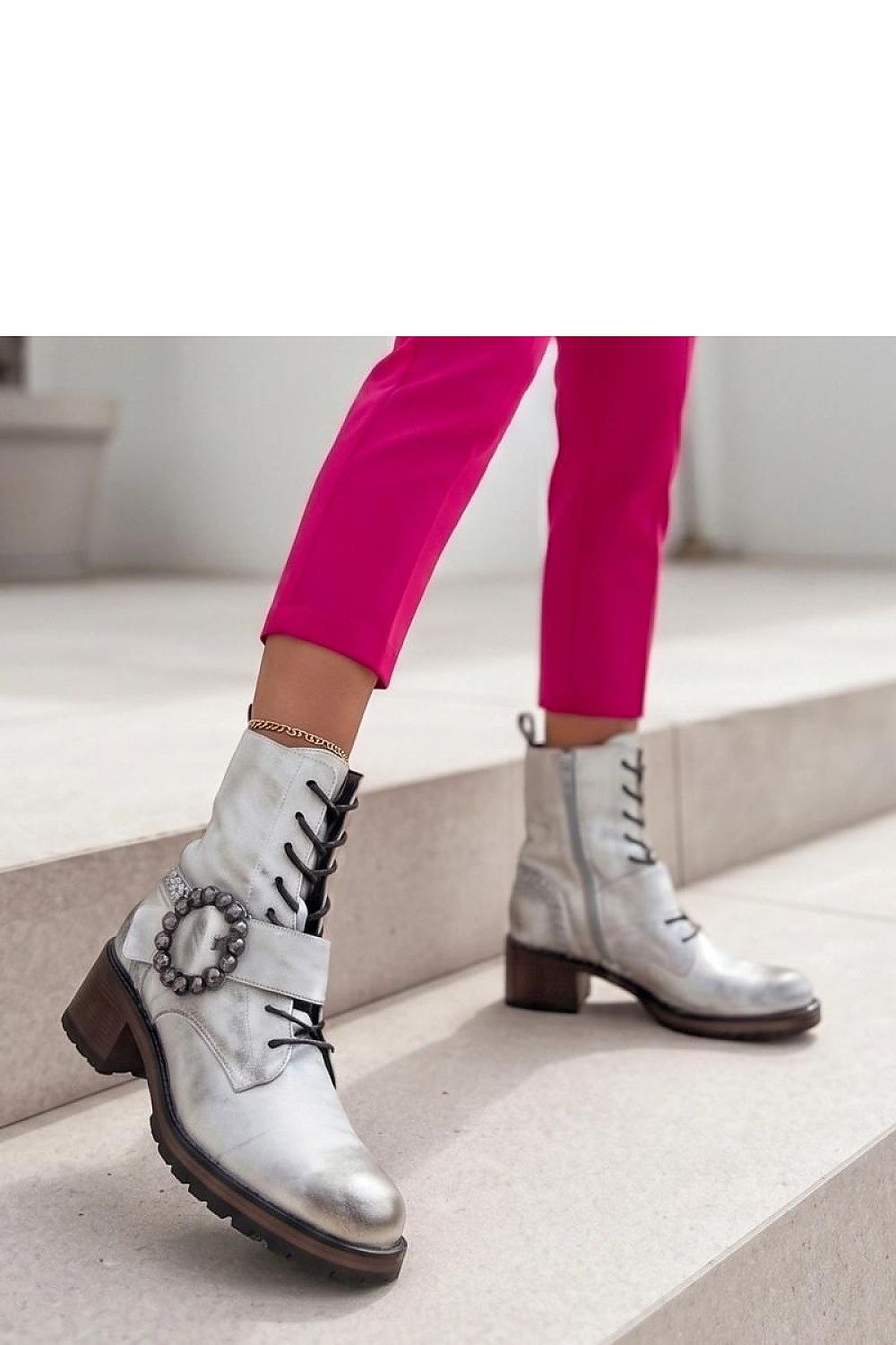 Grey lined ankle boots with padding and buckle